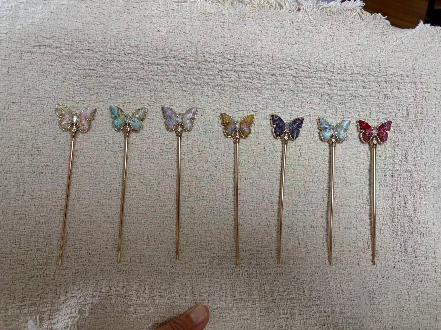 JOFAE Kyoto handmade butterfly hair pin featuring intricate design in gold and pastel colors, perfect for elegant hair accessories.