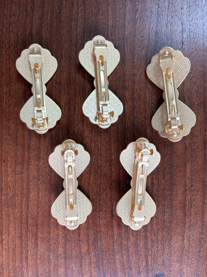 JOFAE Kyoto handmade brocade bow spring hair clip with elegant hold, featuring intricate fabric design and classic style.