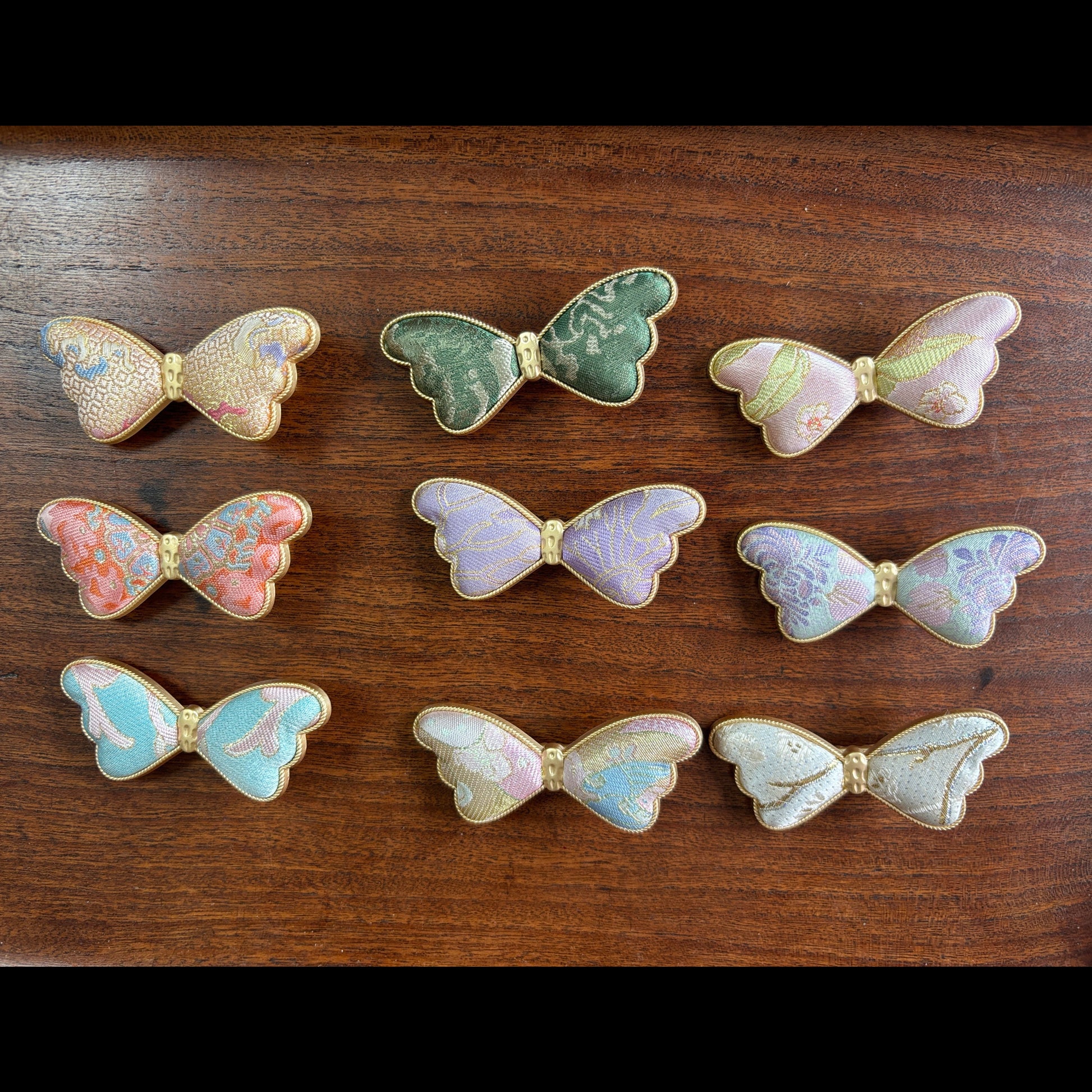 JOFAE Kyoto handmade brocade butterfly hair clip featuring intricate floral patterns and delicate craftsmanship.