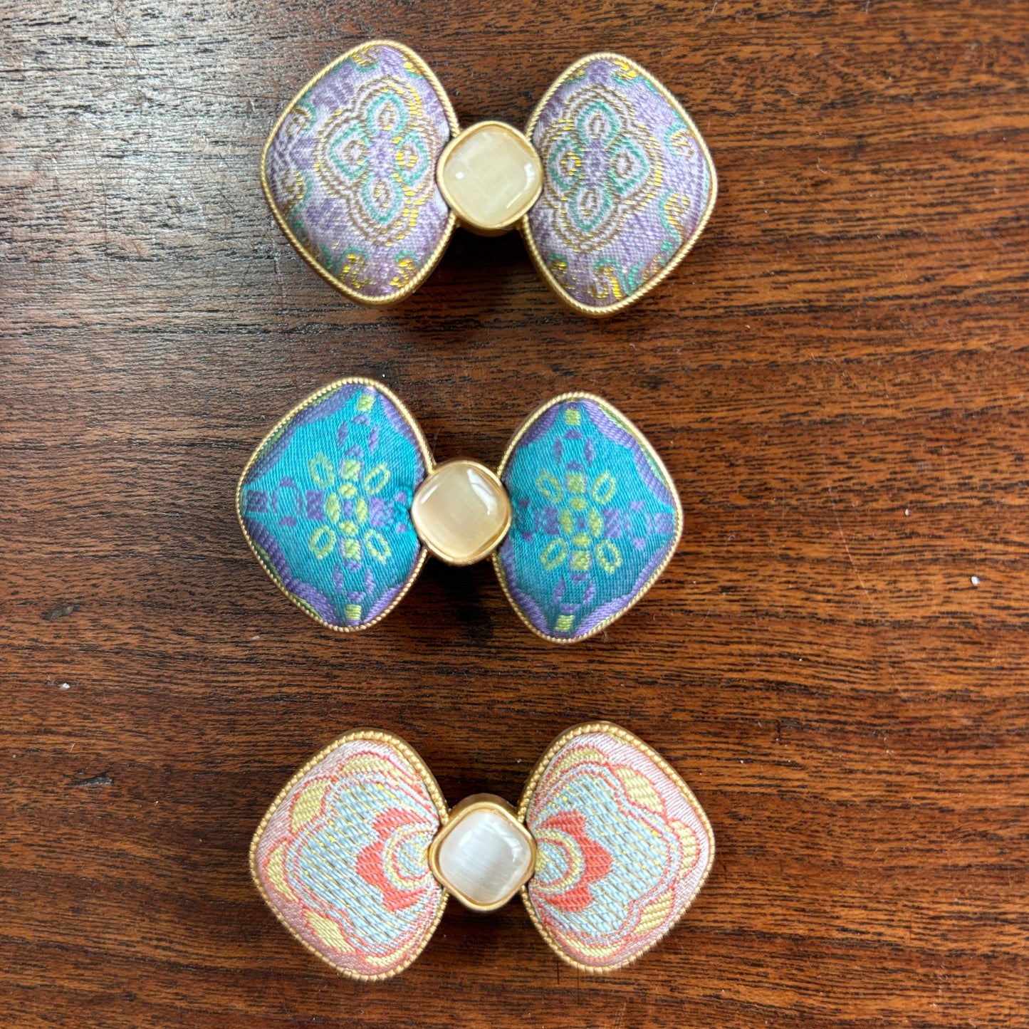 JOFAE Kyoto handmade brocade oval hair clip featuring traditional art design, perfect for elegant hair styling.