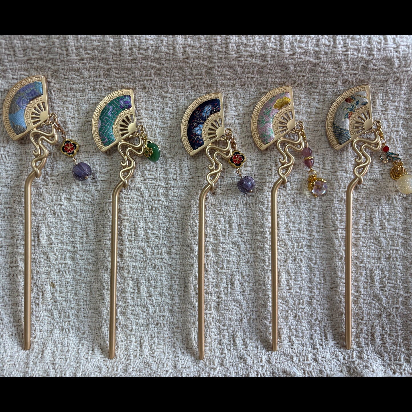 JOFAE Kyoto handmade folding fan hair stick featuring traditional design, symbolizing prosperity and grace, with intricate detailing.
